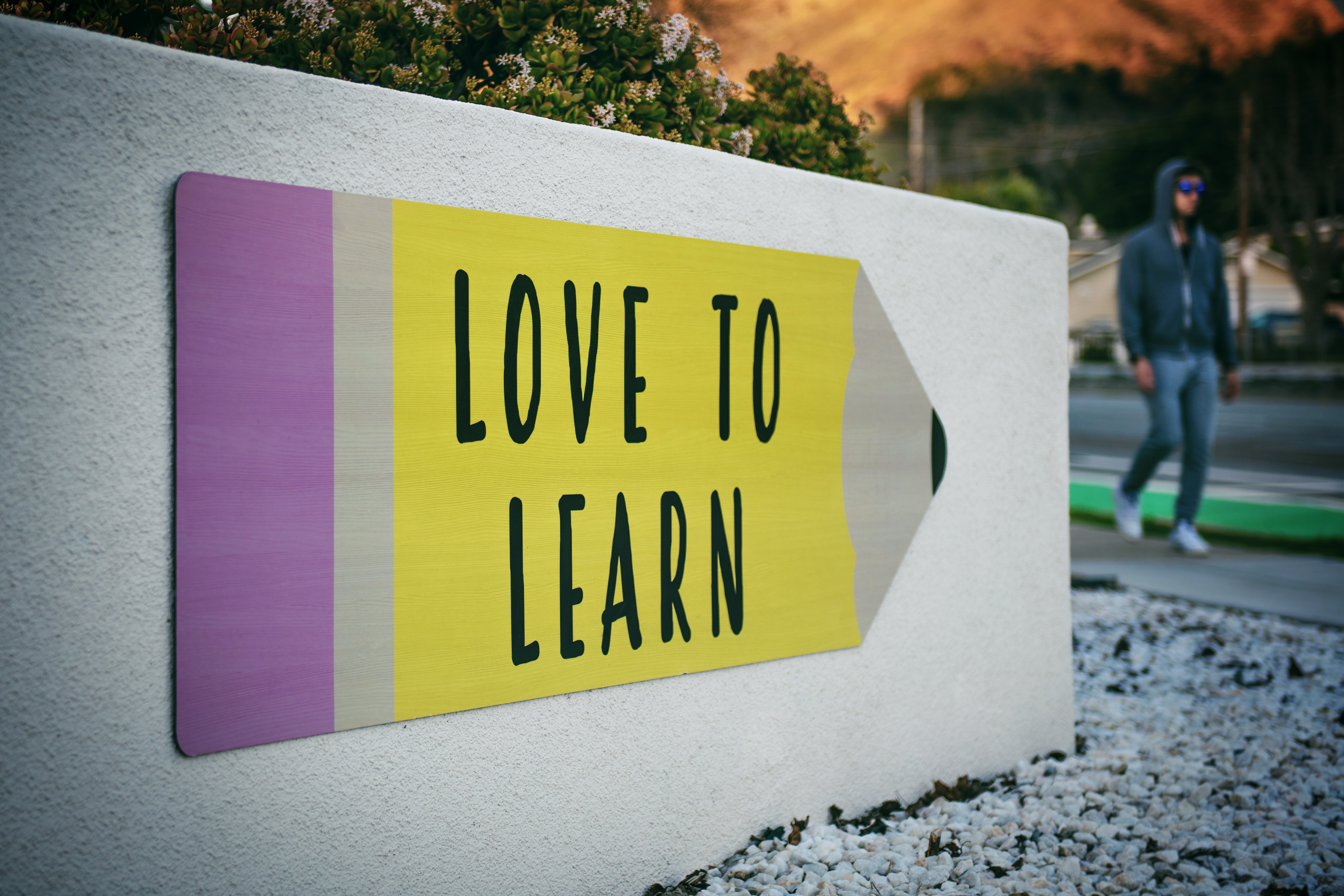 sign that displays 'love to learn'